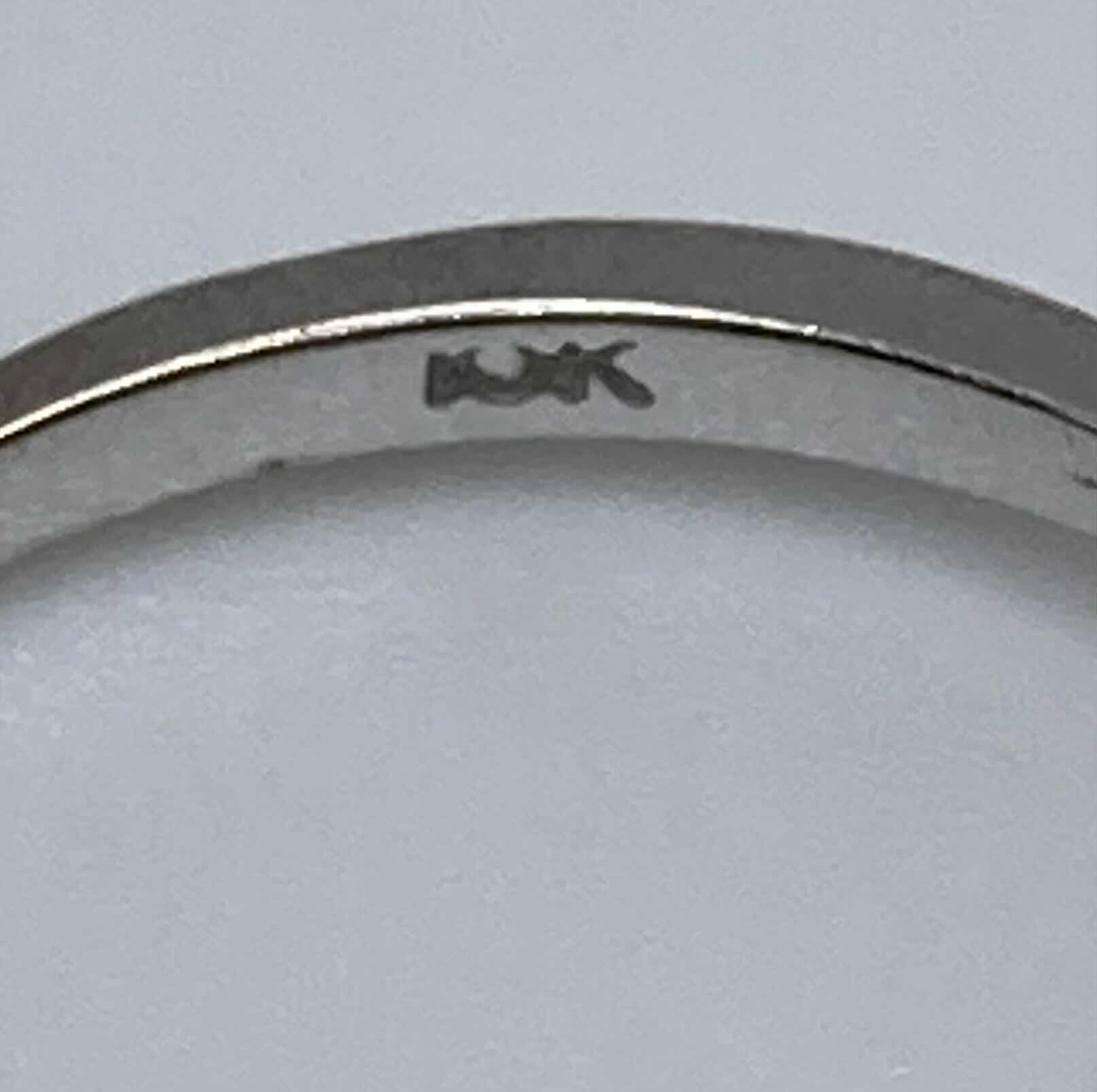 Photo 1 of 10K GOLD RING W CLEAR STONES APPROX RING SIZE 8.5-9 (2.0G)