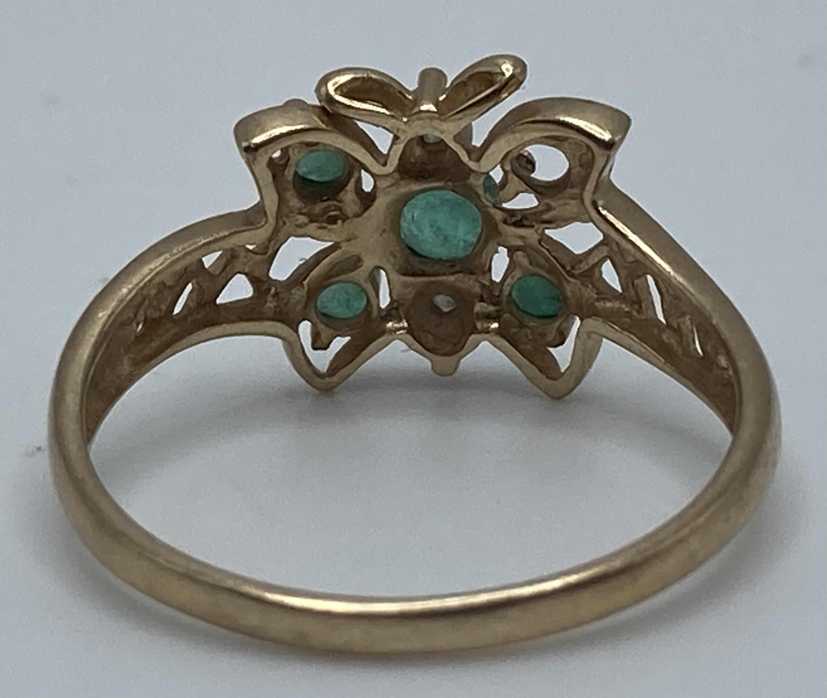 Photo 1 of 10K GOLD RING W AQUA GREEN STONES APPROX RING SIZE 7.5-8 (1.5G)