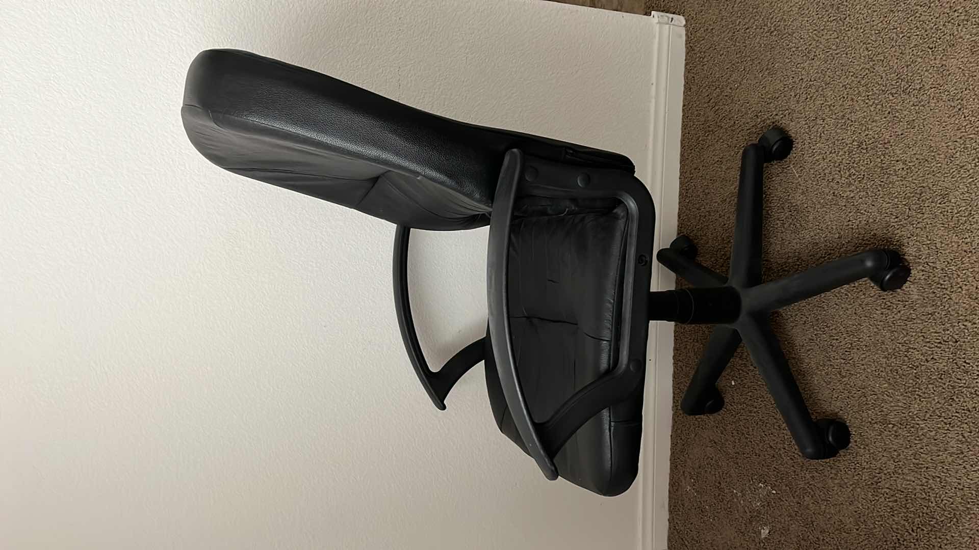 Photo 1 of OFFICE STARS BLACK LEATHER ROLLING OFFICE COMPUTER CHAIR 24” X 26” H43”