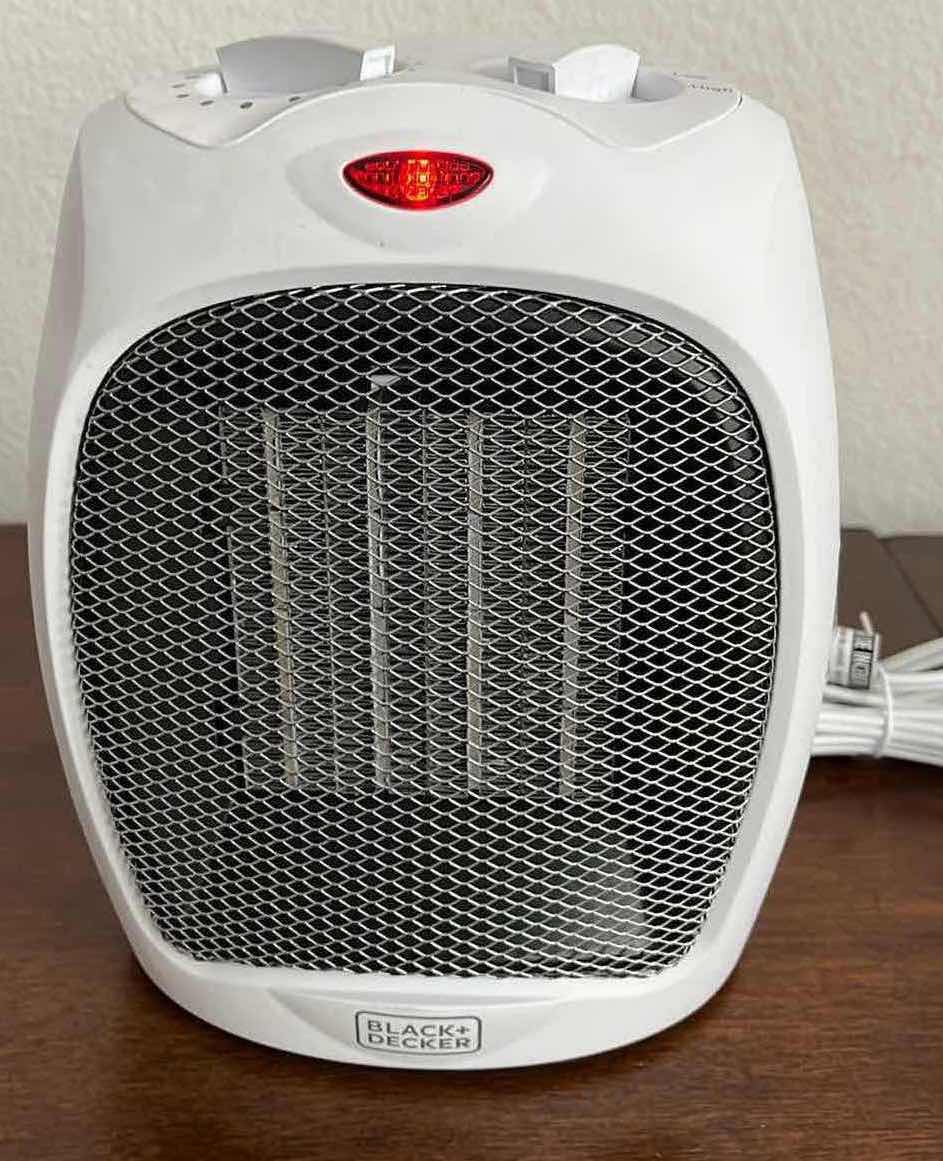 Photo 1 of BLACK & DECKER MINI CERAMIC HEATER/FAN MODEL BHDC500W46