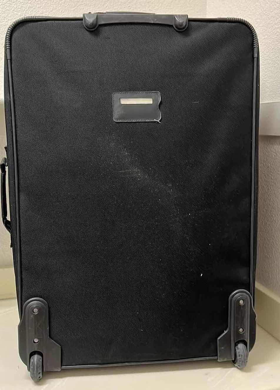 Photo 1 of BLACK ROLLING CHECK LUGGAGE BAG