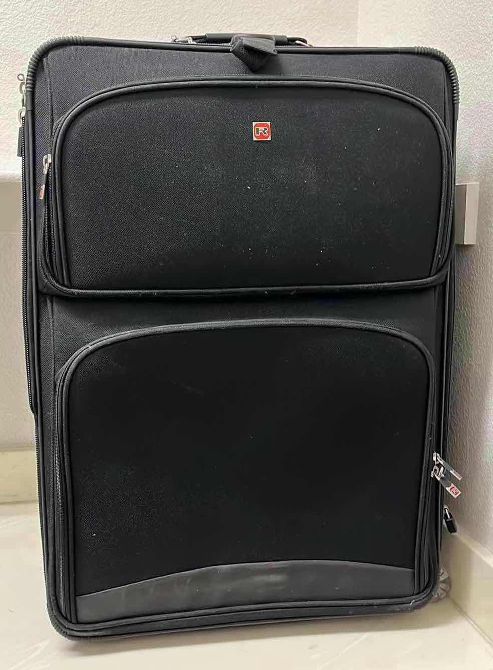 Photo 1 of BLACK ROLLING CHECK LUGGAGE BAG