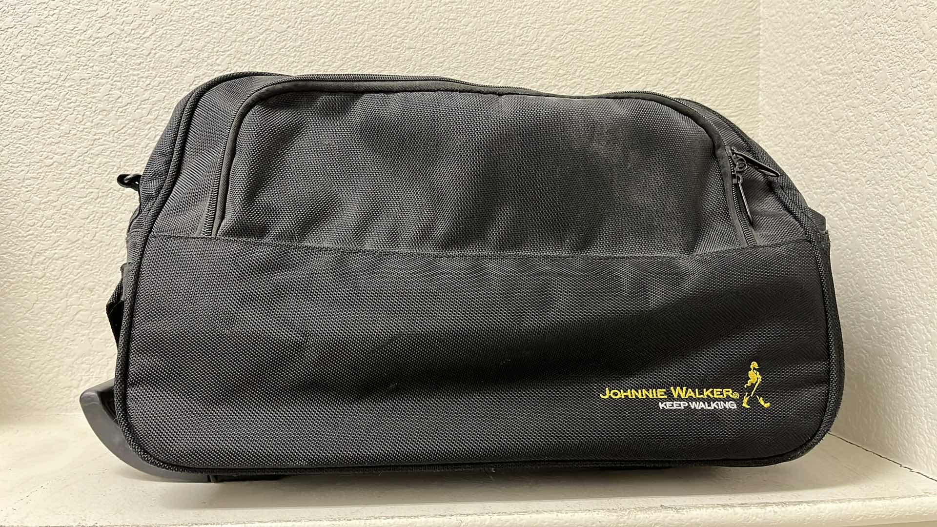 Photo 1 of JONNIE WALKER KEEP WALKING BLACK ROLLING CARRY ON DUFFLE BAG