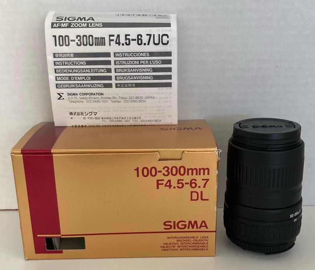 Photo 1 of SIGMA 100-300MM F4.5-6.7 DL AUTOFOCUS LENS (FOR NIKON)