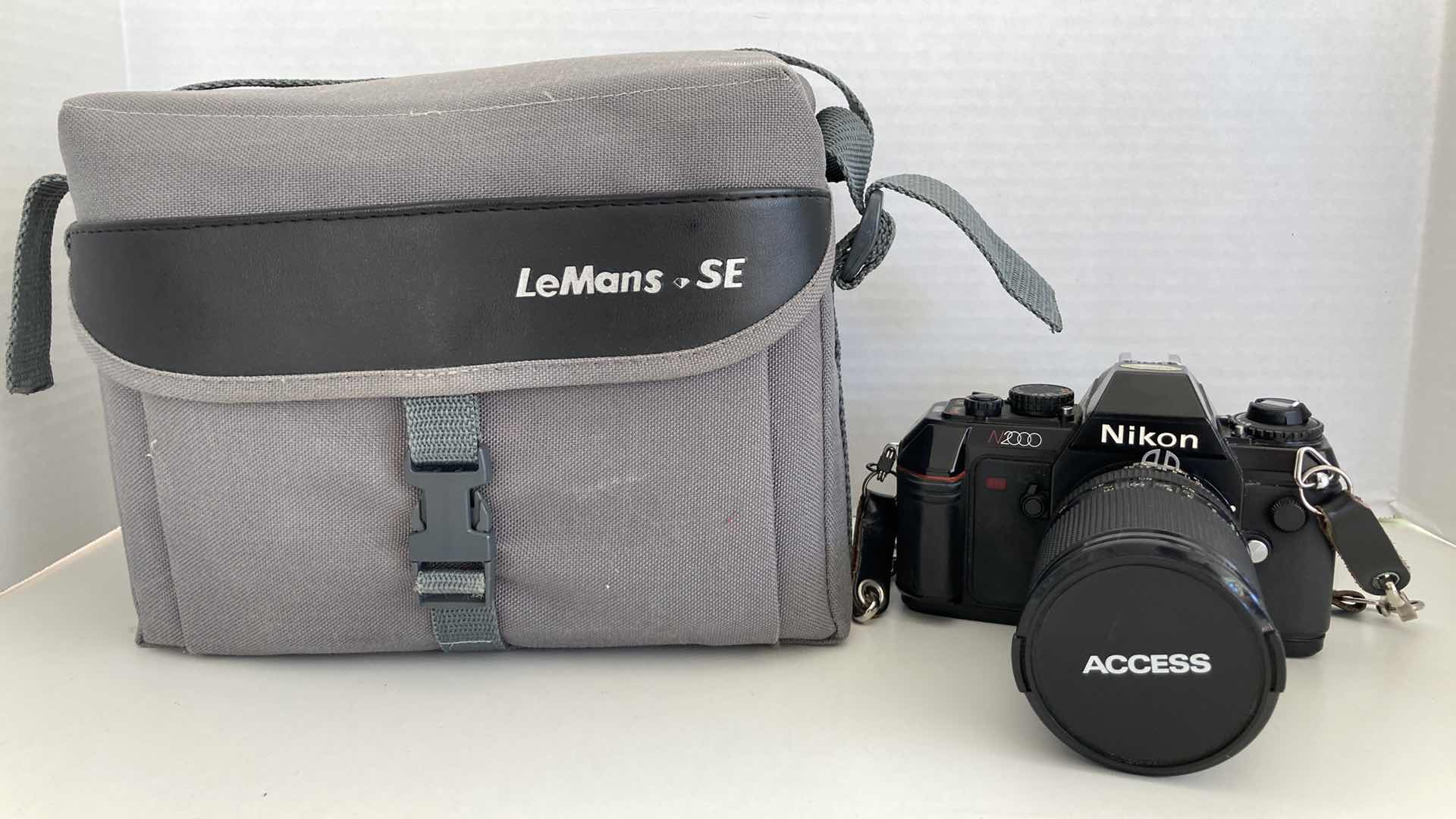 Photo 1 of NIKON N2000 35MM SLR W ACCESS 28-80MM F3.5-4.5 & LEMANS SE CARRYING CASE