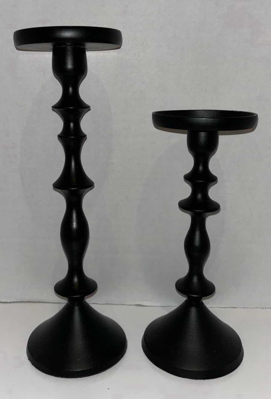 Photo 1 of PIER 1 IMPORTS SET OF 2 BLACK PILLAR CANDLE STICKS (9.5” & 12”)