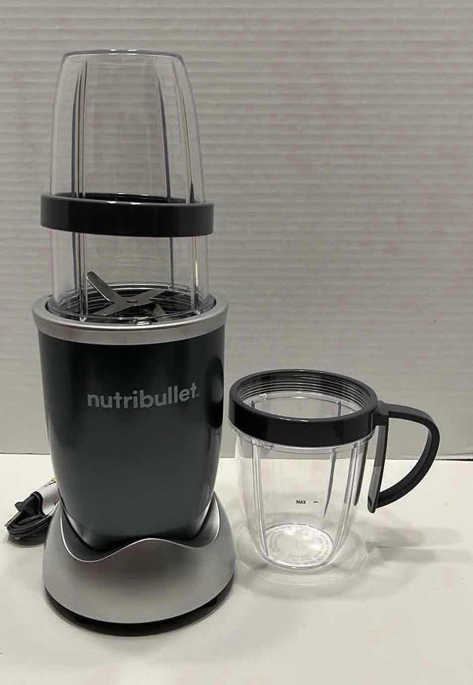 Photo 1 of NUTRIBULLET PERSONAL 24OZ BLENDER W EXTRA CUP MODEL NB-101B