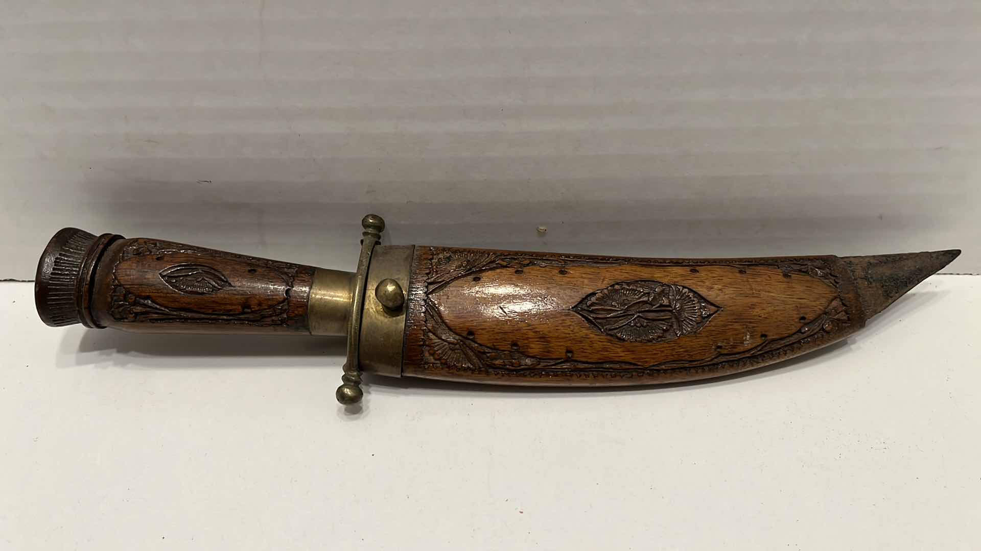 Photo 4 of INDIAN CARVED WOOD BRASS HANDLE FIXED CURVED BLADE KNIFE W WOOD CARVED SCABBARD 2.25” X 10.5”