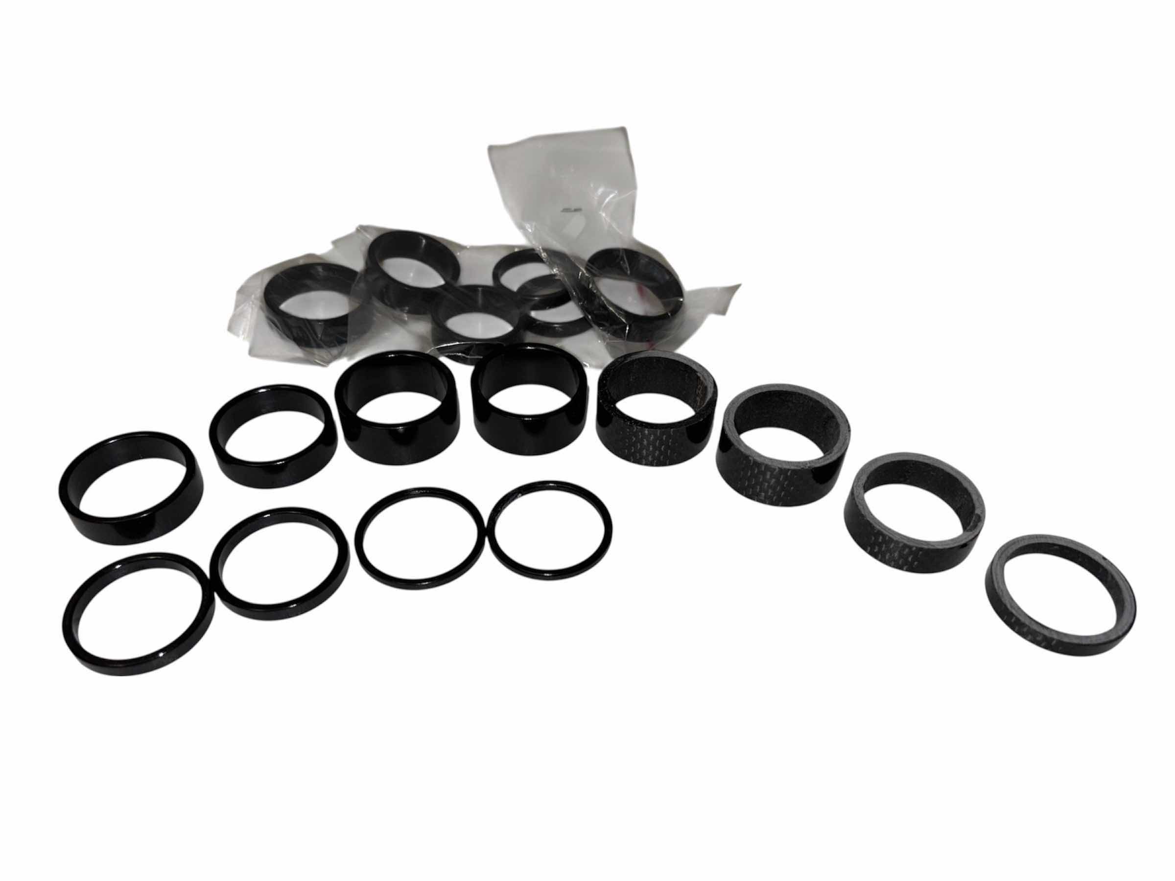 Photo 1 of UNBRANDED HOLLOW HEADSET SPACERS, 18 PCS BLACK/CARBON FIBER