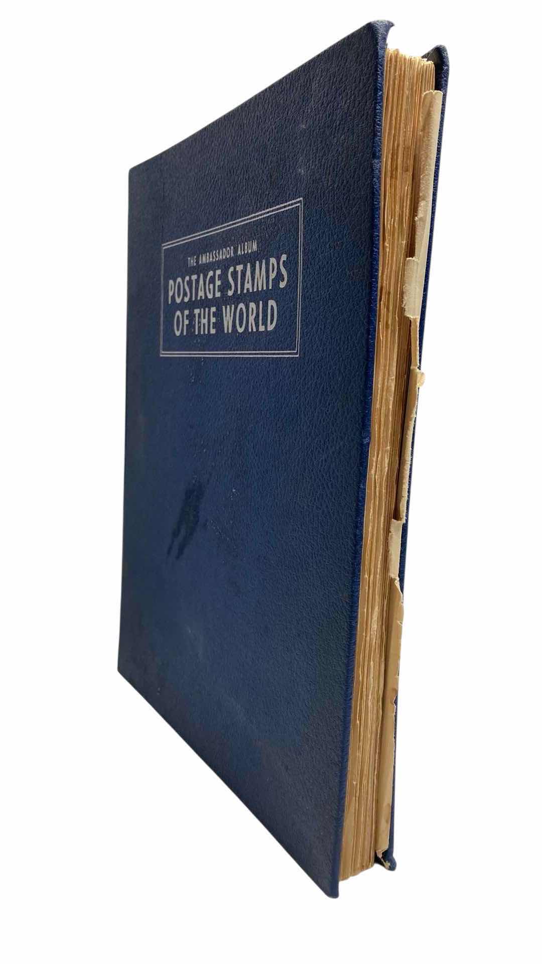 Photo 1 of THE AMBASSADOR ALBUM POSTAGE STAMPS OF THE WORLD BOOKLET PRINTED 1957 COPYRIGHT 1954 W STAMPS FROM AROUND THE WORLD