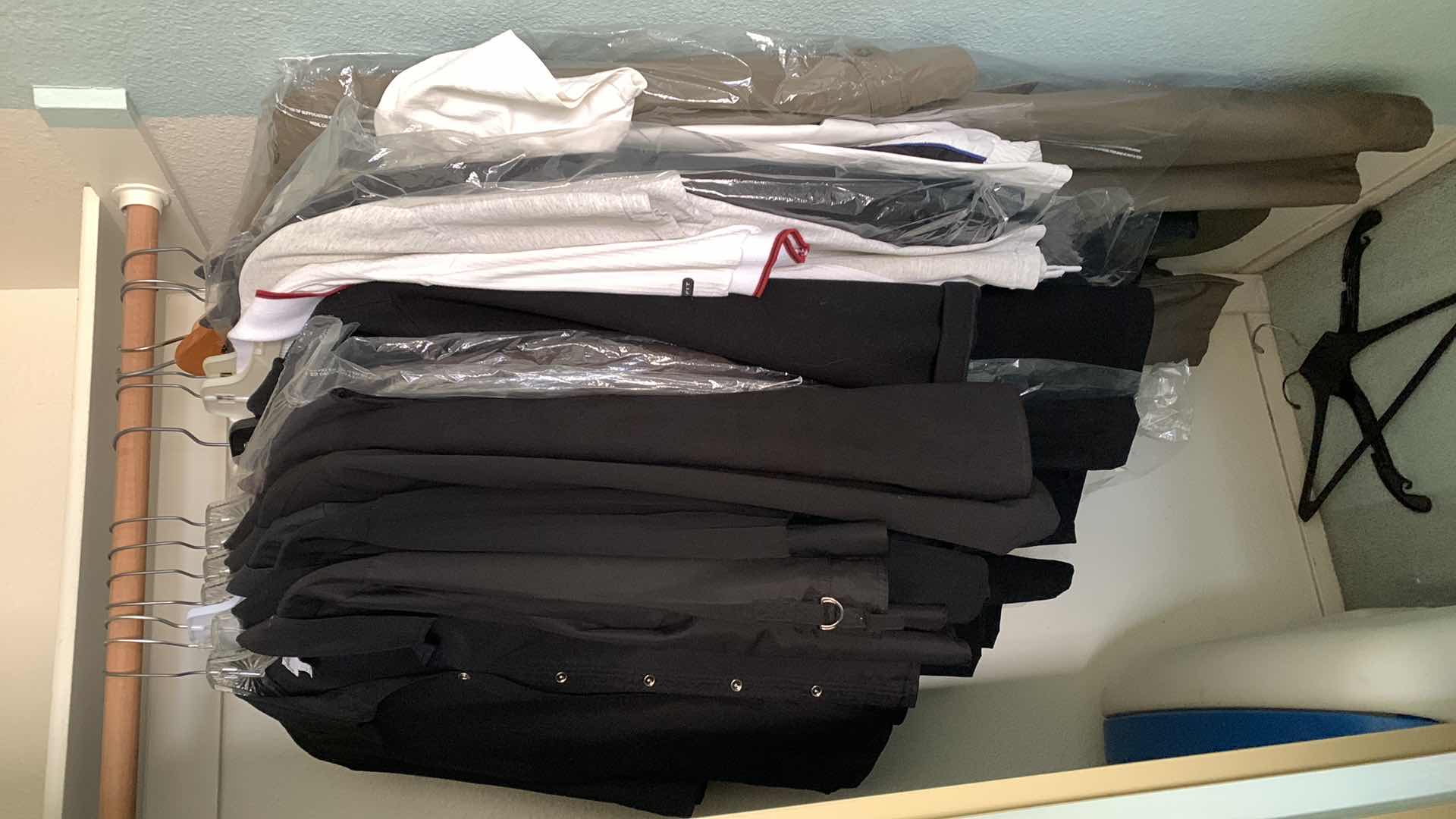 Photo 1 of CONTENTS OF CLOSET WOMEN’S SIZE MEDIUM AND LARGE
