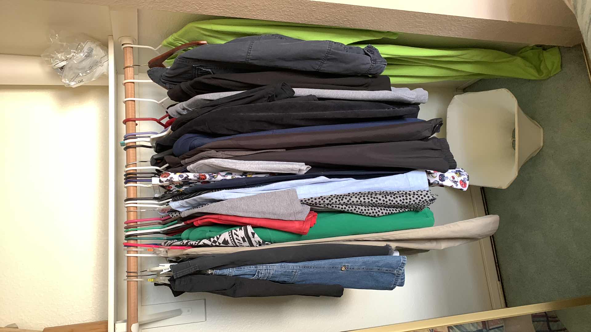 Photo 1 of CONTENTS OF CLOSET MENS AND WOMENS CLOTHING COLLECTION UNLV