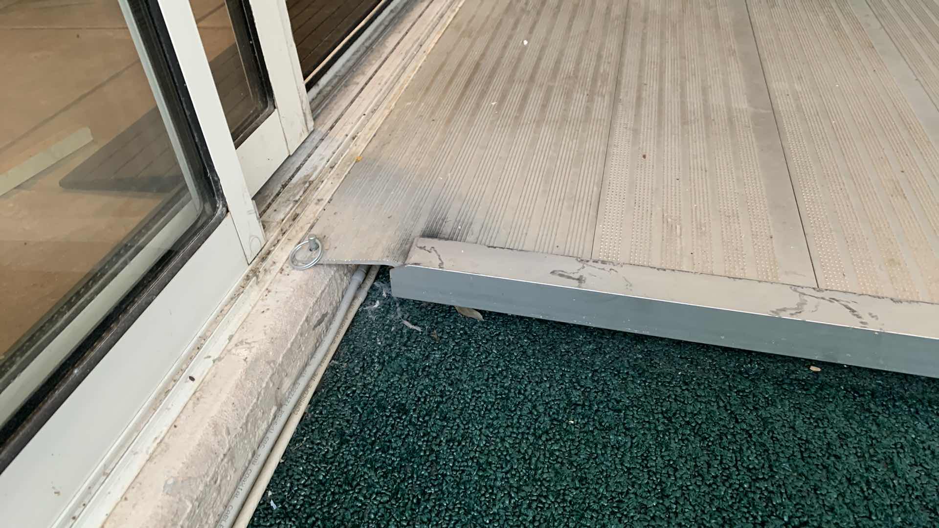 Photo 1 of PAIR OF ALUMINUM WHEEL CHAIR RAMPS FOR DOORS