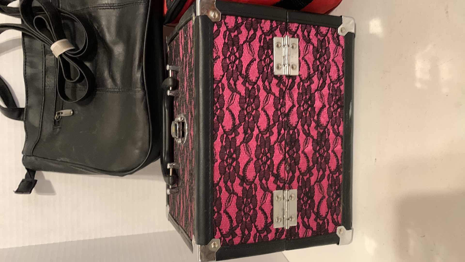 Photo 1 of WOMENS BAGS AND AN ICE CHEST