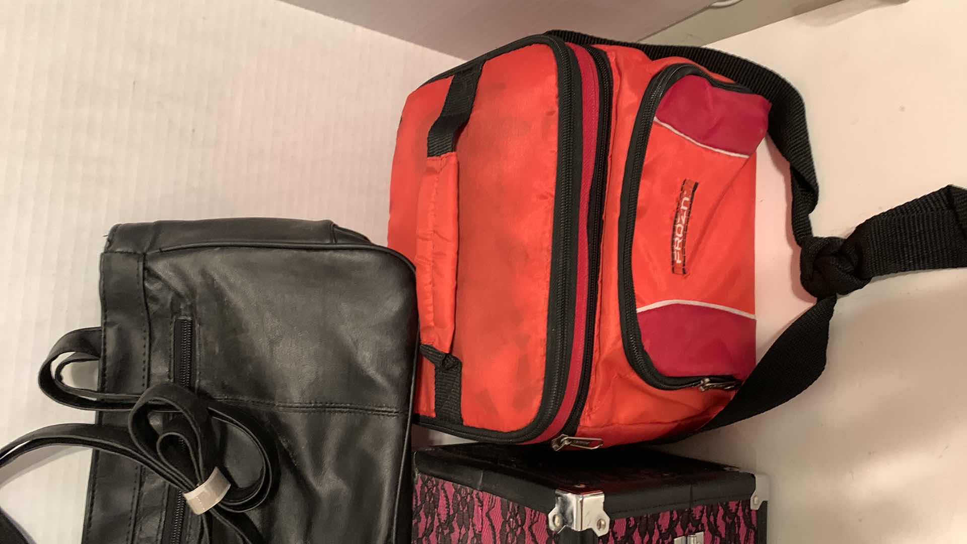 Photo 1 of WOMENS BAGS AND AN ICE CHEST