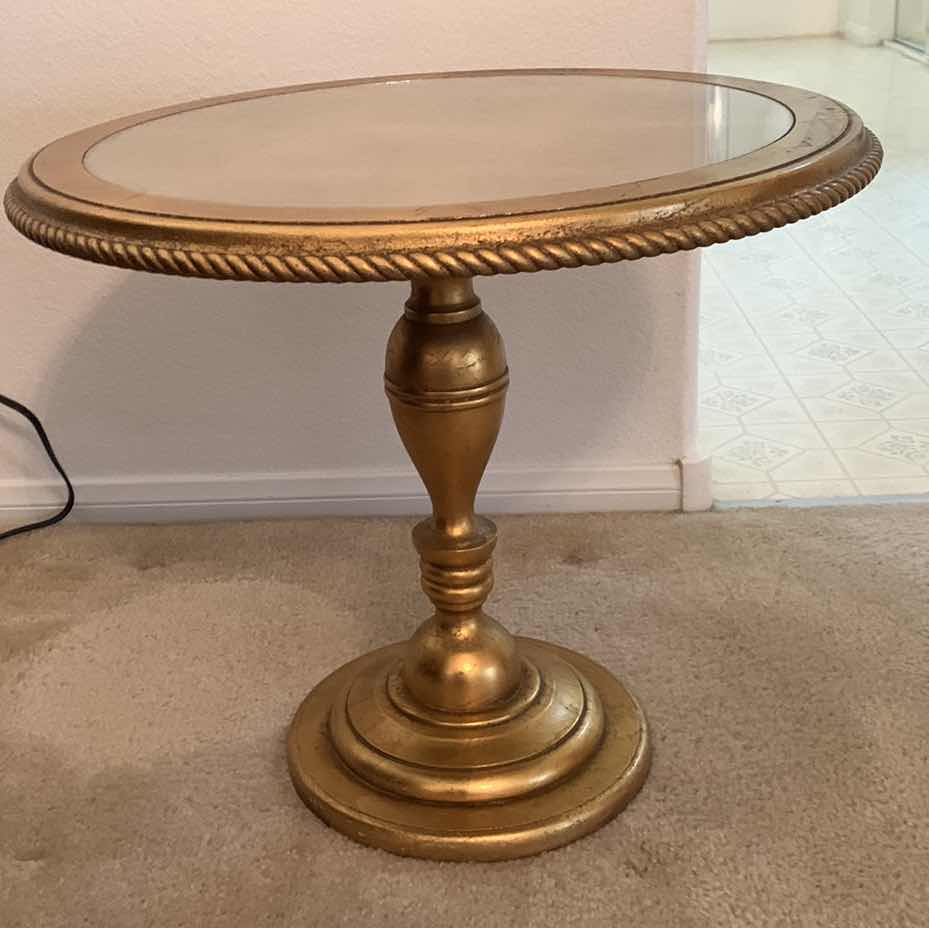 Photo 1 of GOLD PAINTED CIRCULAR TABLE WITH GLASS TOP 28” H 17”