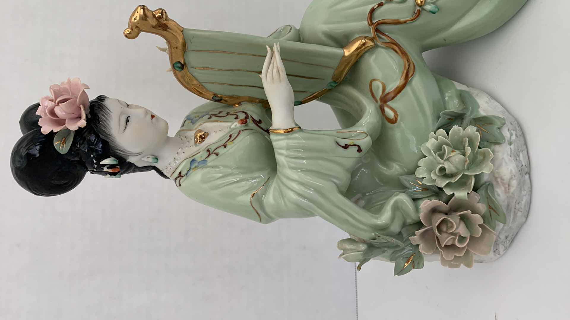 Photo 2 of ORIENTAL INSPIRED PORCELAIN STATUE 10” X 11”