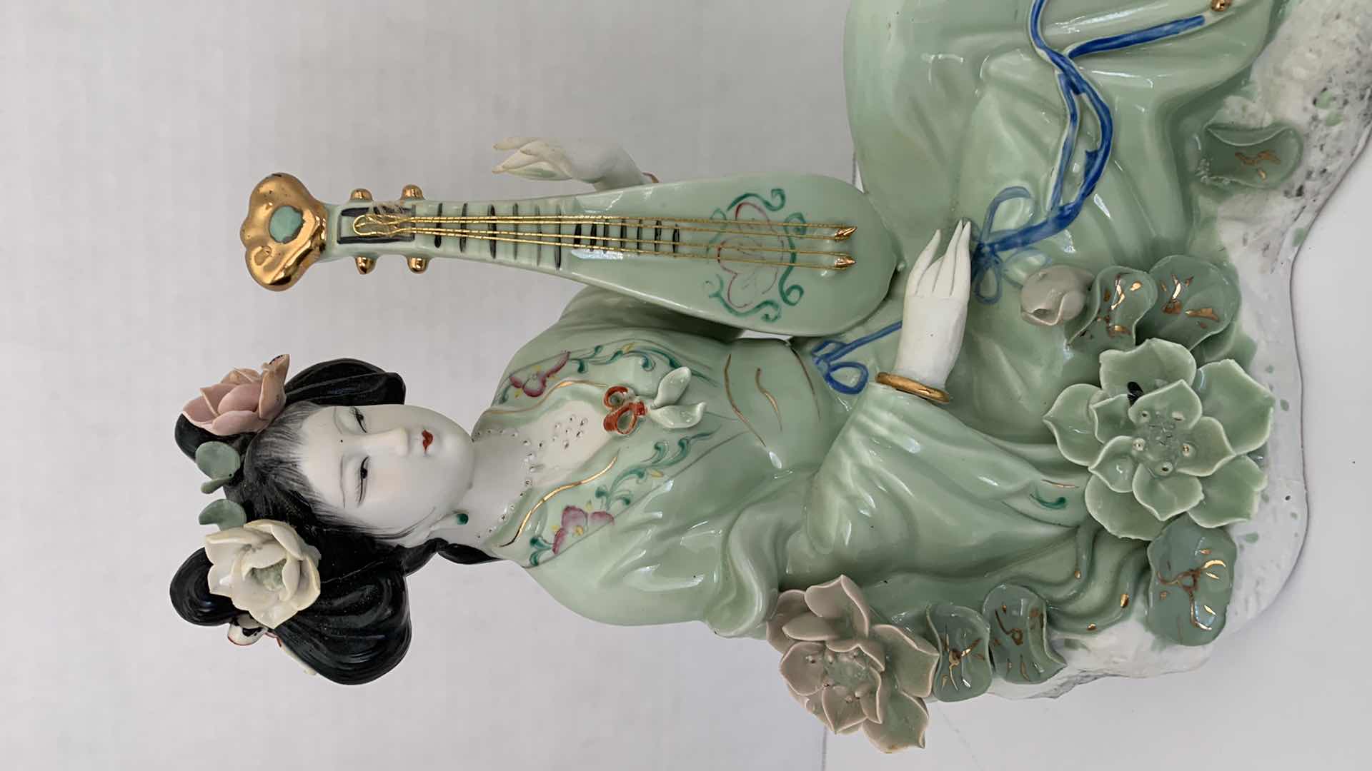 Photo 2 of ORIENTAL INSPIRED PORCELAIN STATUE 10” X 9”
