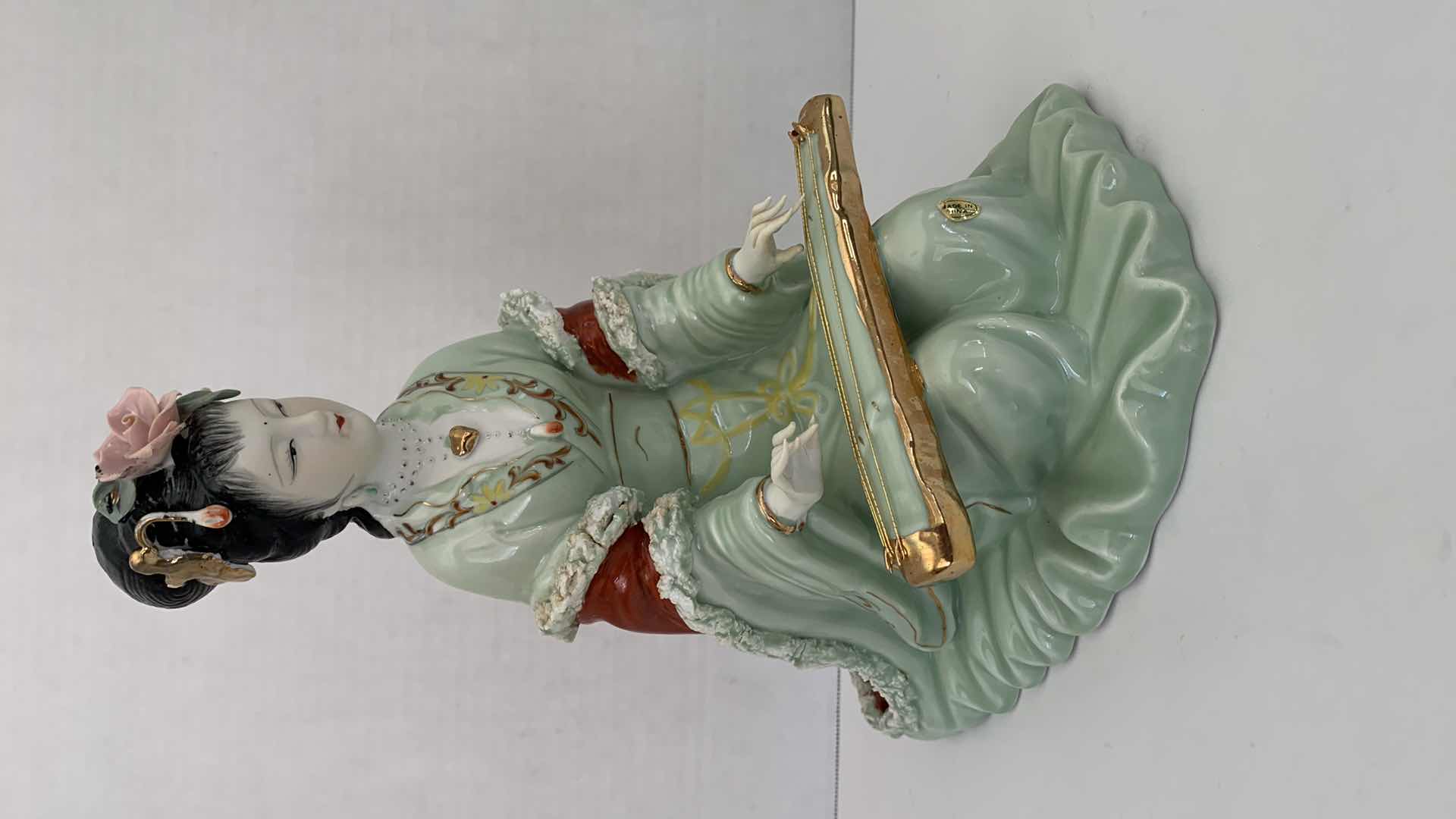 Photo 1 of ORIENTAL INSPIRED PORCELAIN STATUE10” X 11”