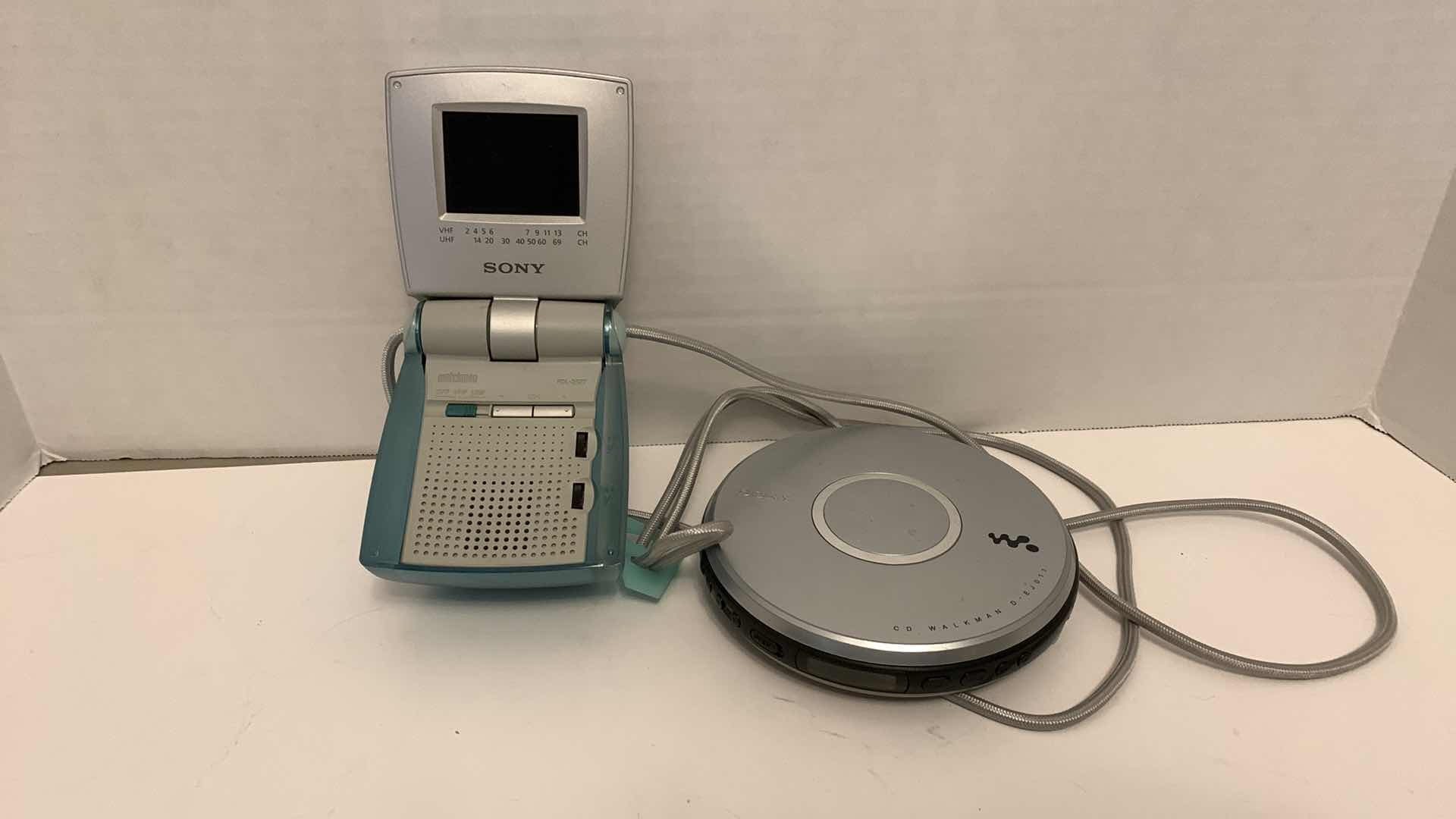 Photo 1 of SONY WATCHMAN 2.5” COLOR TELEVISION MODEL FDL-252T AND A SONY CD WALKMAN D-EJ011