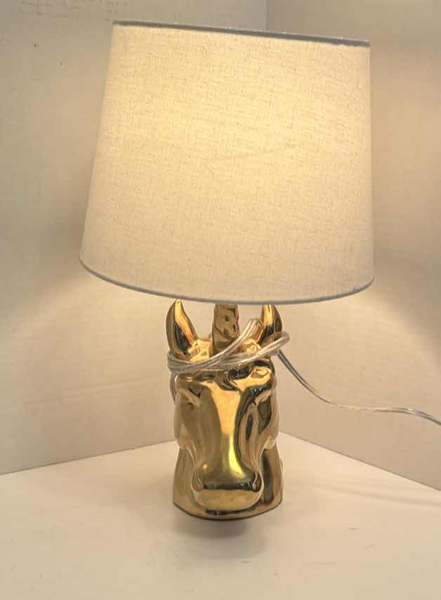 Photo 1 of GOLD UNICORN DESK LAMP
15.5”