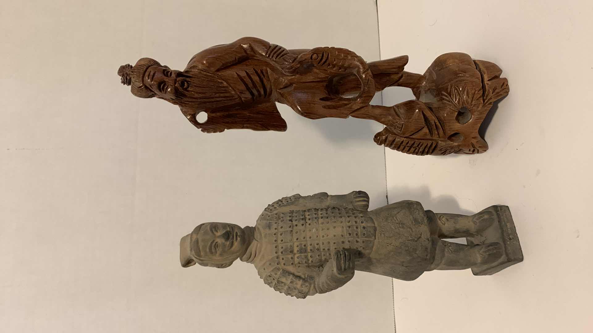 Photo 1 of PAIR OF ORIENTAL INSPIRED STATUES TALLEST IS 12”