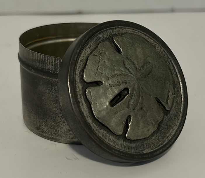 Photo 2 of METAL FIGURINES: SAND DOLLAR TIN, FISHERMAN, CANNON