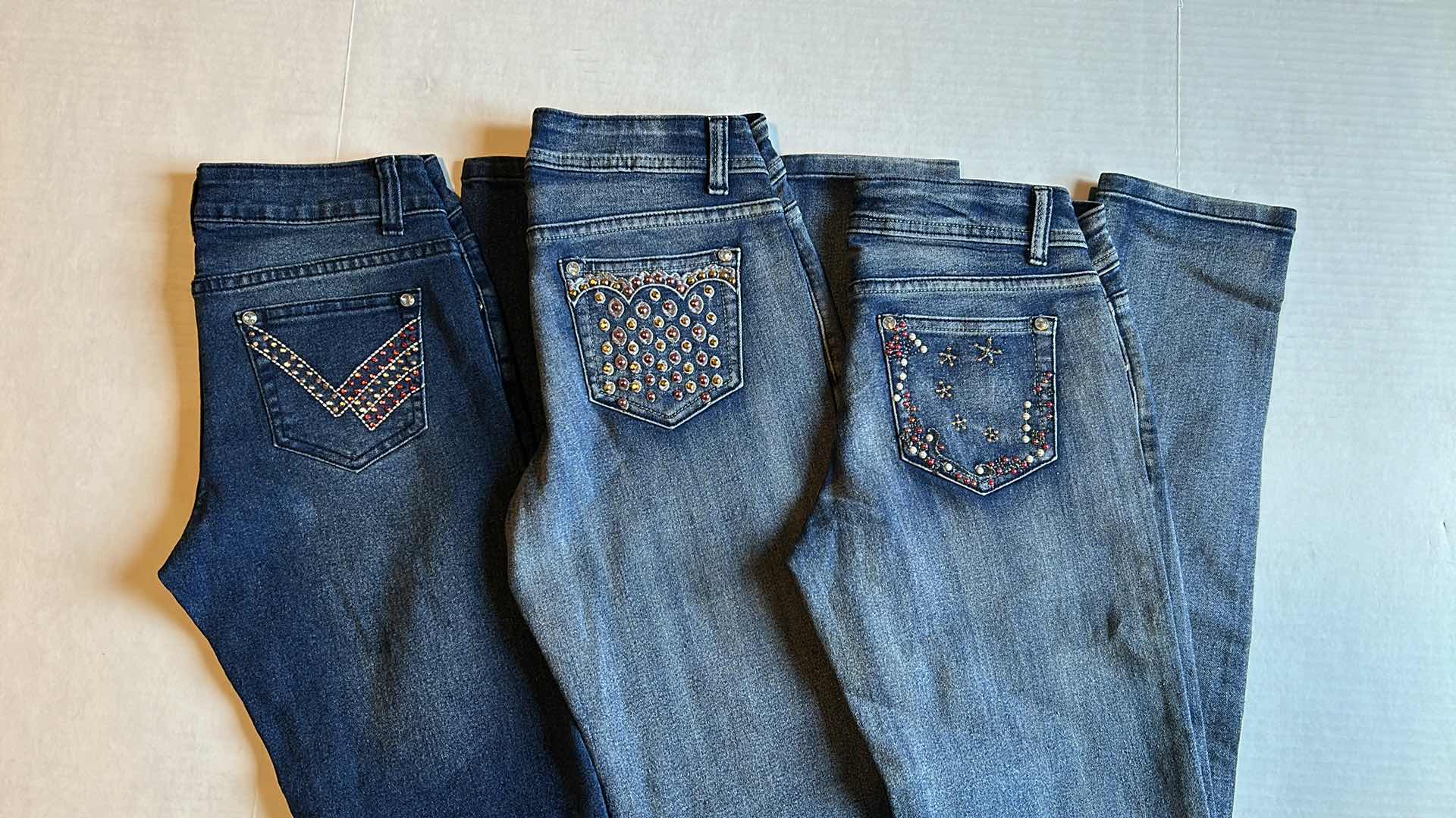 Photo 1 of THREE STRAIGHT LEG GIRL JEAN SIZE 1