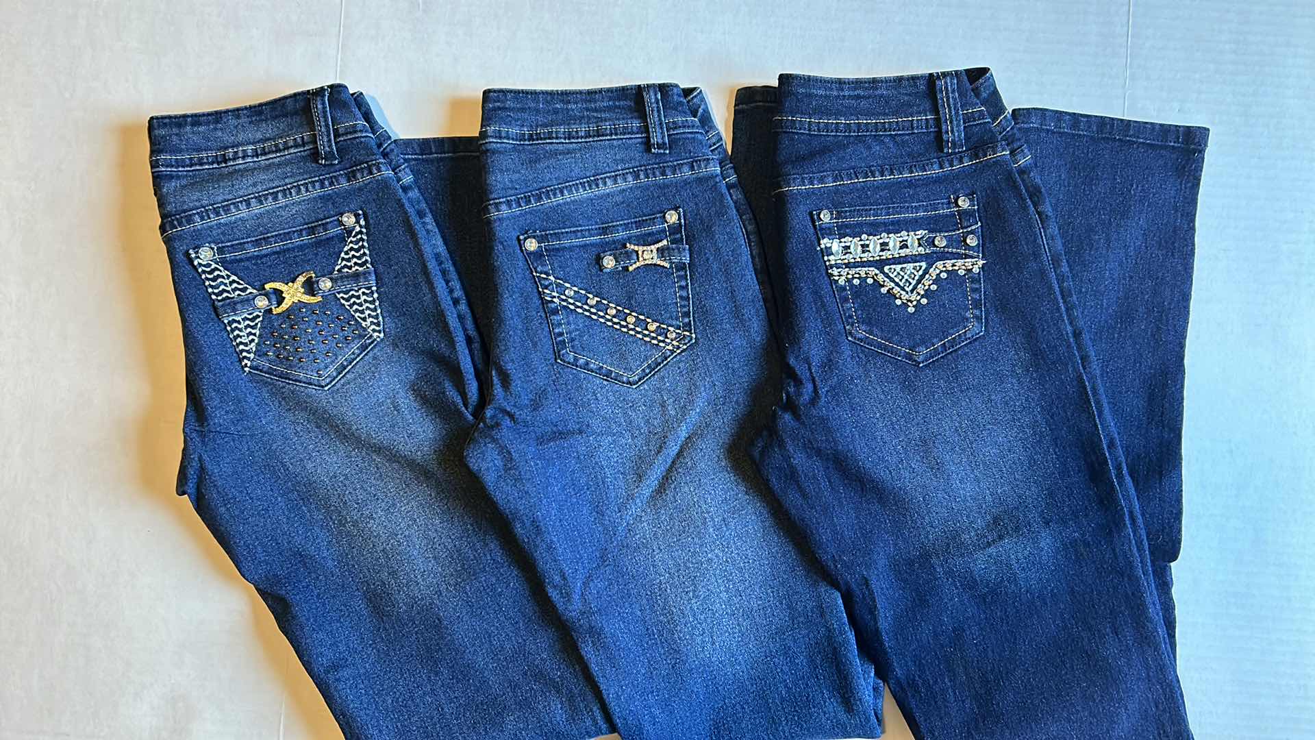 Photo 1 of SET OF SIZE 5 STRAIGHT LEG GIRL JEAN SIZE 1