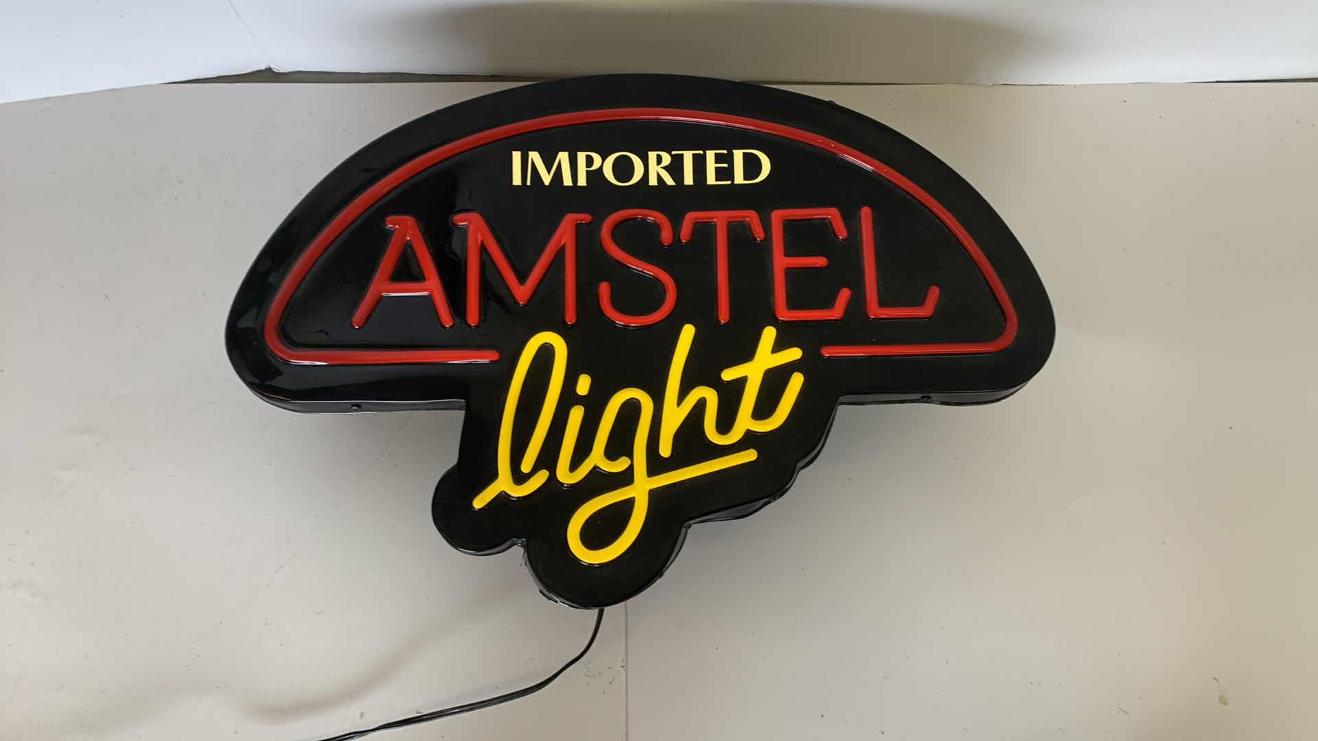 Photo 1 of AMSTEL LIGHT IMPORTED BEER SIGN 22” X 15”