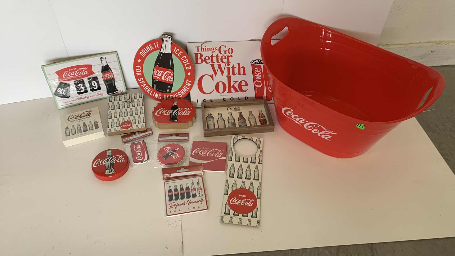 Photo 1 of ASSORTED COCA COLA ITEMS