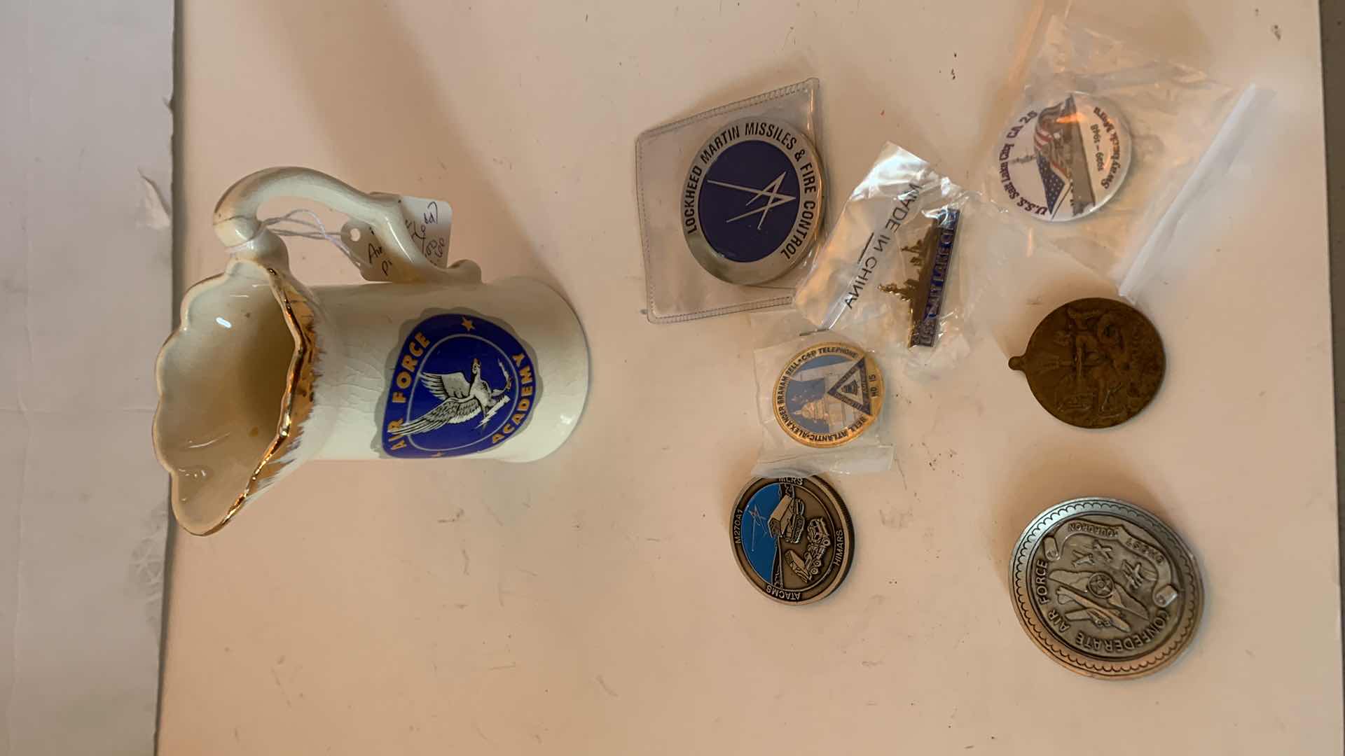 Photo 1 of UNITED STATES NAVY BUTTONS AND PINS AND AIR FORCE ACADEMY VASE