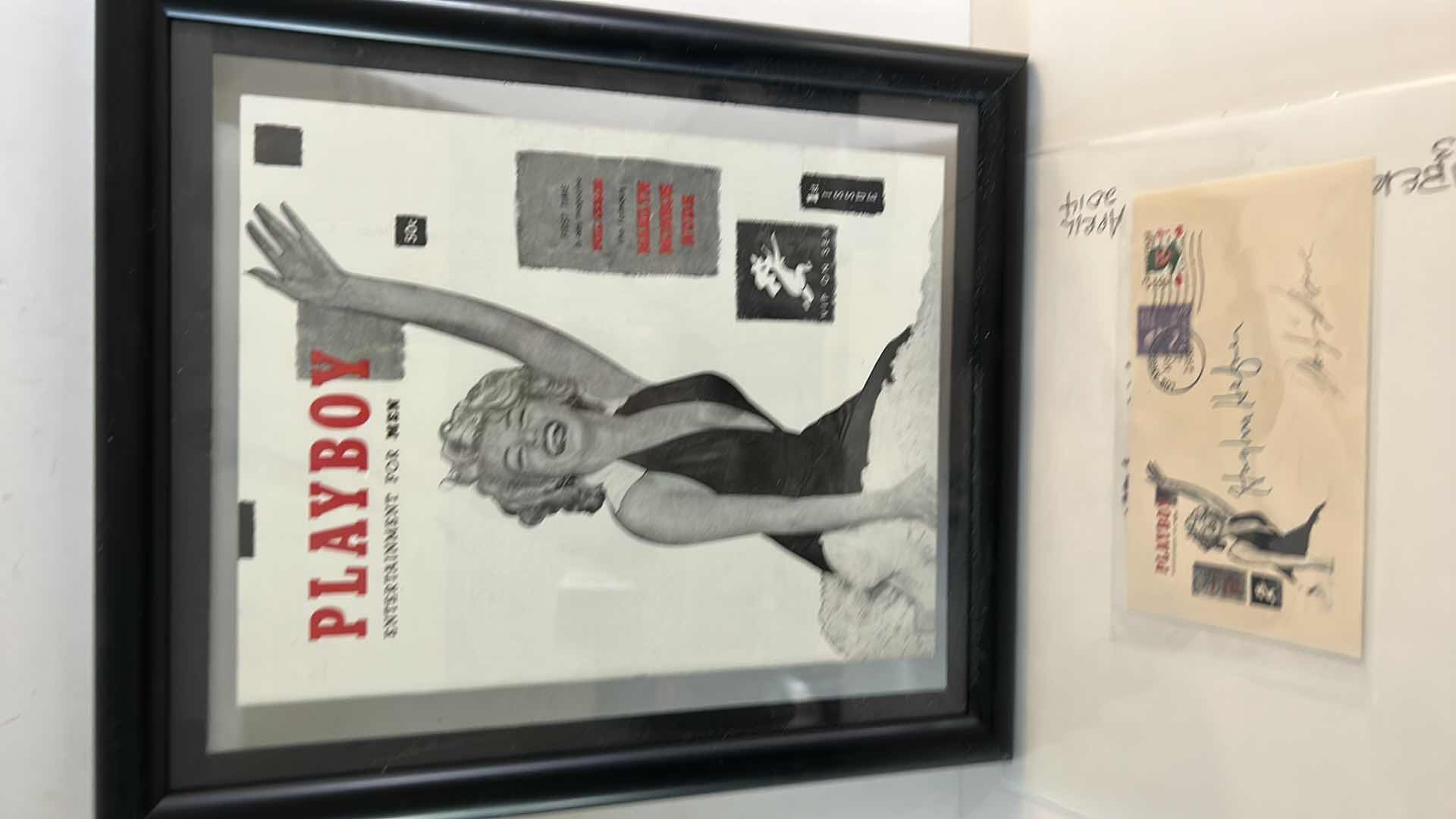 Photo 1 of 1955 ENVELOPE WITH MARILYN MONROE AND HUGH HEFNER SIGNATURES AND 1953 PLAYBOY COVER OF MARILYN MONROE FRAMED 12.25” x 14.25”