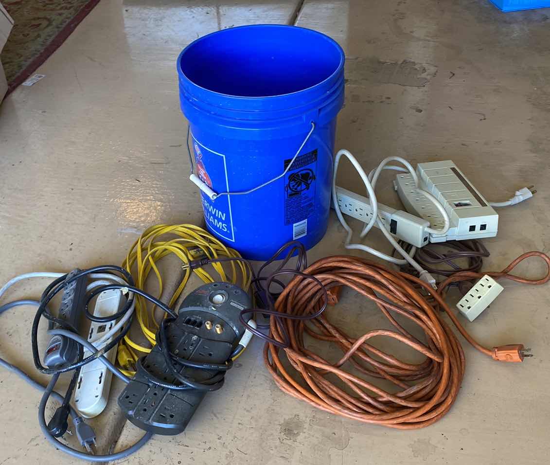 Photo 1 of BUCKET WITH ELECTRICAL CORDS AND SURGE PROTECTORS