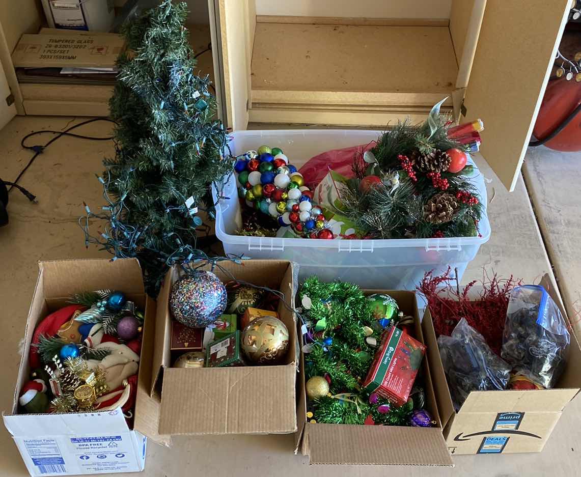 Photo 1 of ASSORTED CHRISTMAS DECOR IN GARAGE CABINET