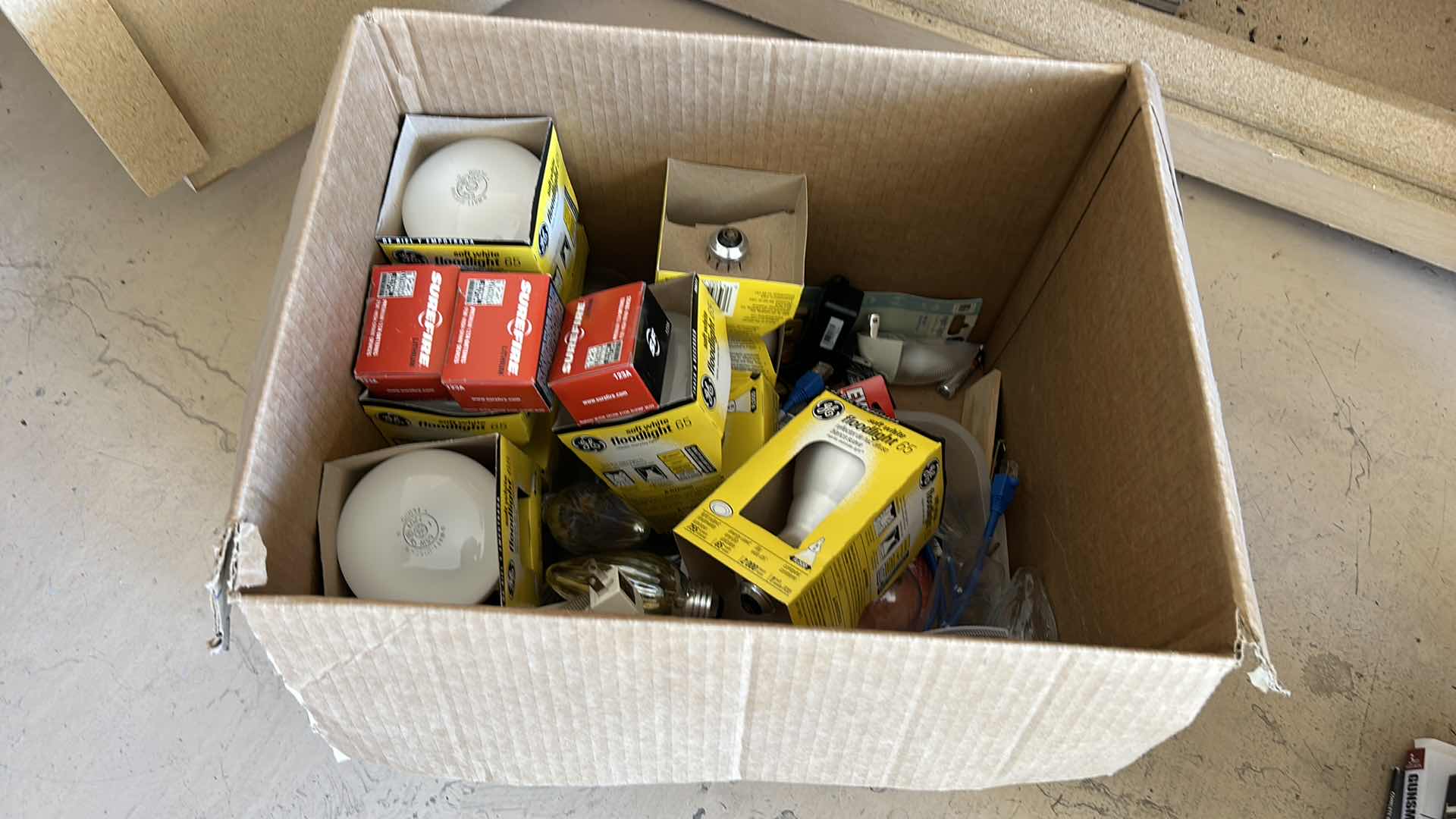 Photo 1 of BOX FULL OF LIGHT BULBS, BATTERIES AND MORE