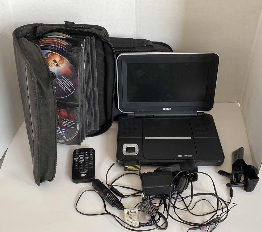 Photo 1 of RCA DVD PLAYER WITH CORDS REMOTE AND CASE WITH CSI MIAMI DVDS