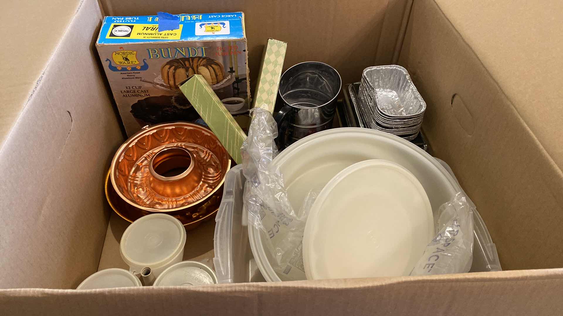 Photo 1 of CONTENTS OF BOX - BUNDT PAN AND ASSORTED BAKING ITEMS