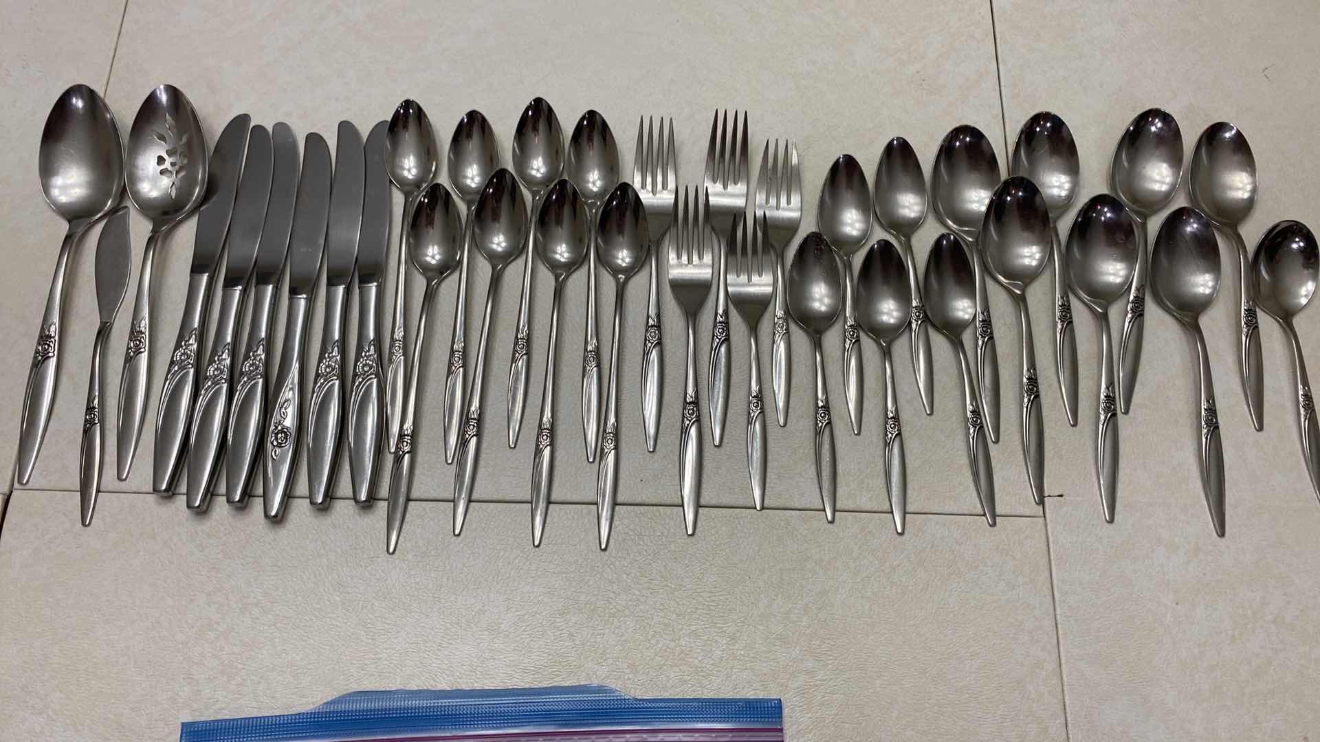 Photo 2 of ROGERS STAINLESS ONEIDA 35 PIECES