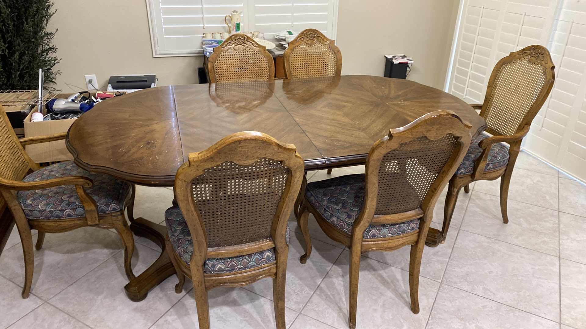 Photo 3 of WOOD DINING TABLE WITH 6 CAN BACK CHAIRS 35” X 42” H29.5” AND 2 LEAFS 20” EACH. TABLE PADS INCLUDED - NEEDS REFINISHING