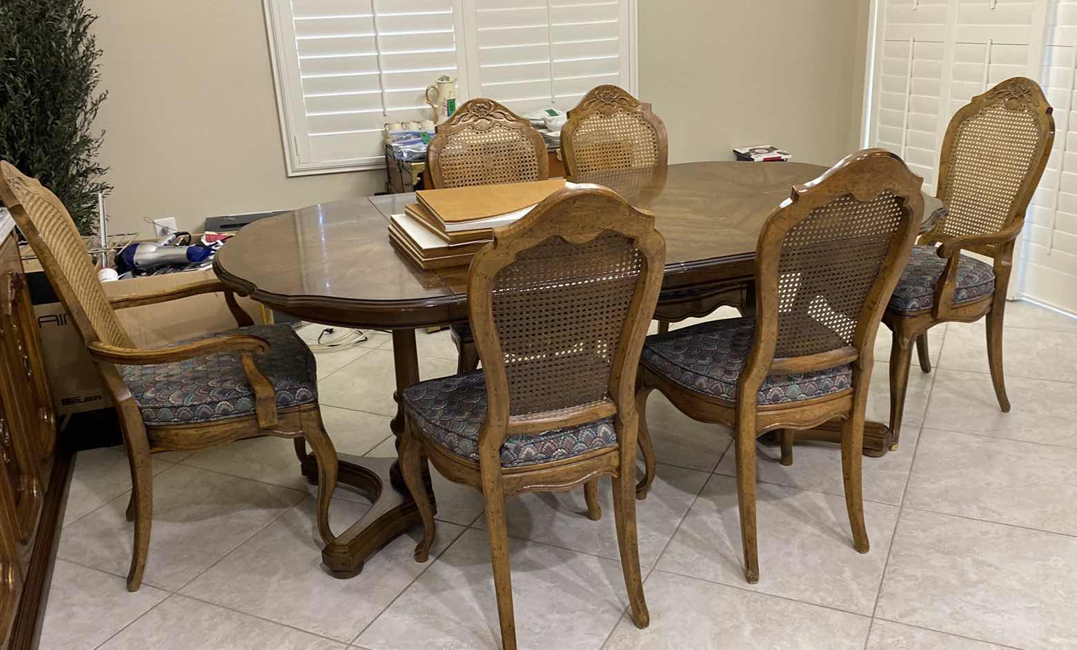 Photo 1 of WOOD DINING TABLE WITH 6 CAN BACK CHAIRS 35” X 42” H29.5” AND 2 LEAFS 20” EACH. TABLE PADS INCLUDED - NEEDS REFINISHING