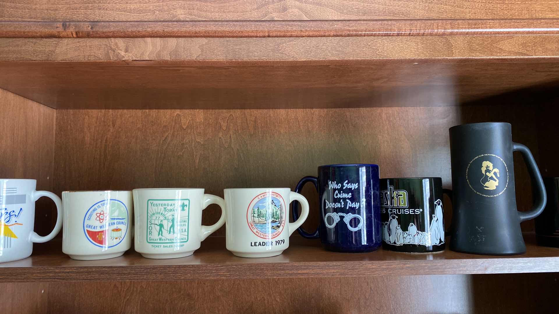 Photo 3 of TWO SHELVES OF COLLECTABLE COFFEE CUPS