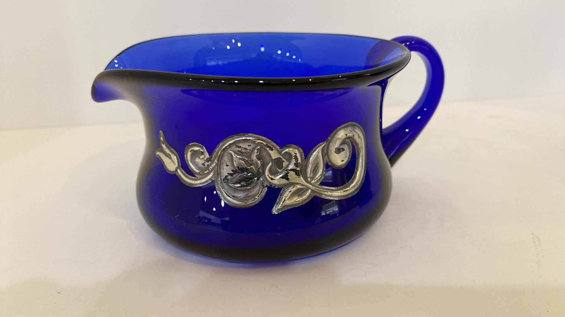 Photo 3 of BADASH BLUE CRYSTAL BOWL 5 1/2” x 3 1/2” AND BLUE GLASS PITCHER WITH SILVER EMBELLISHMENT