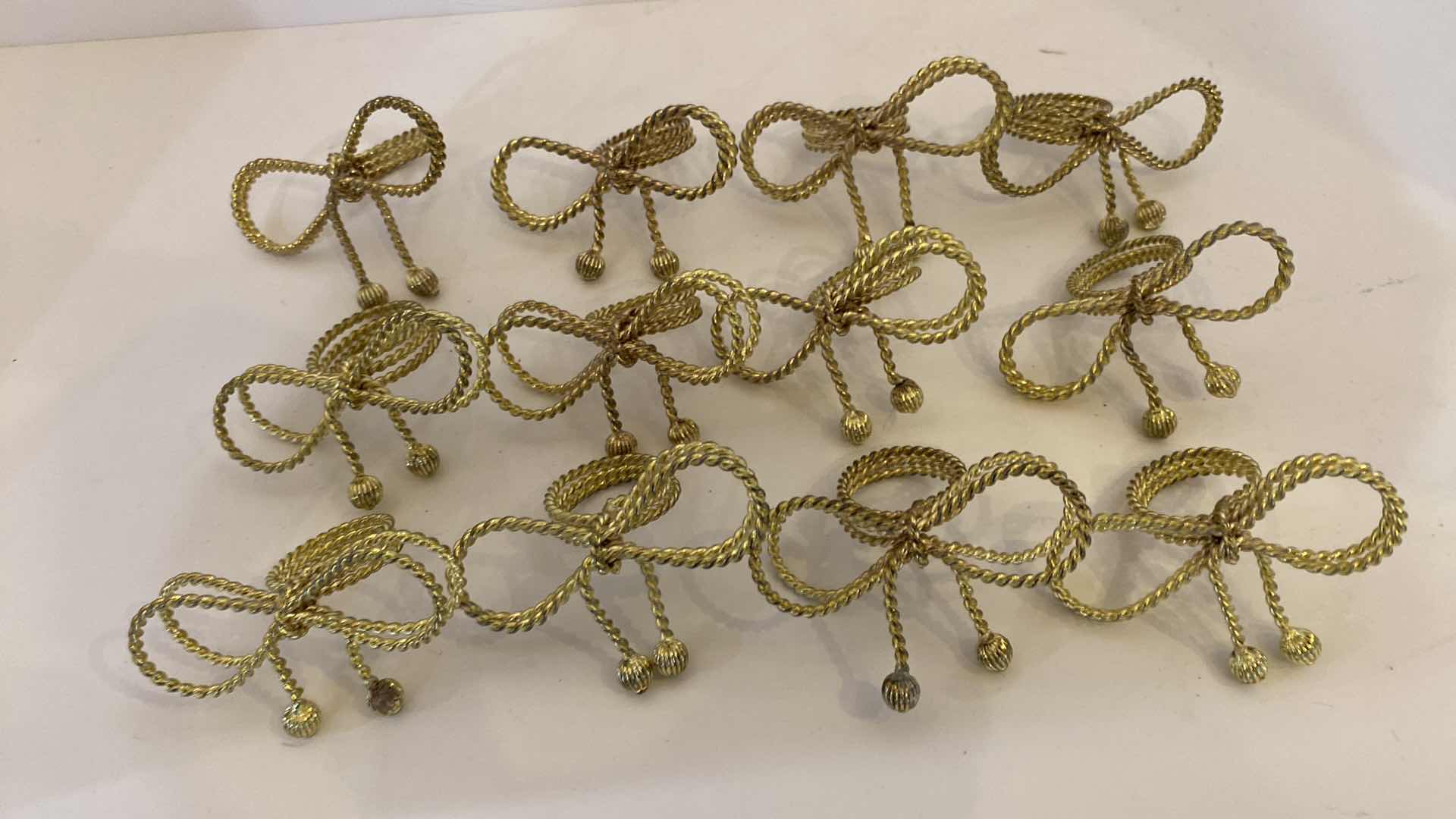 Photo 2 of 13 GOLD BRAIDED BOWS NAPKIN RINGS