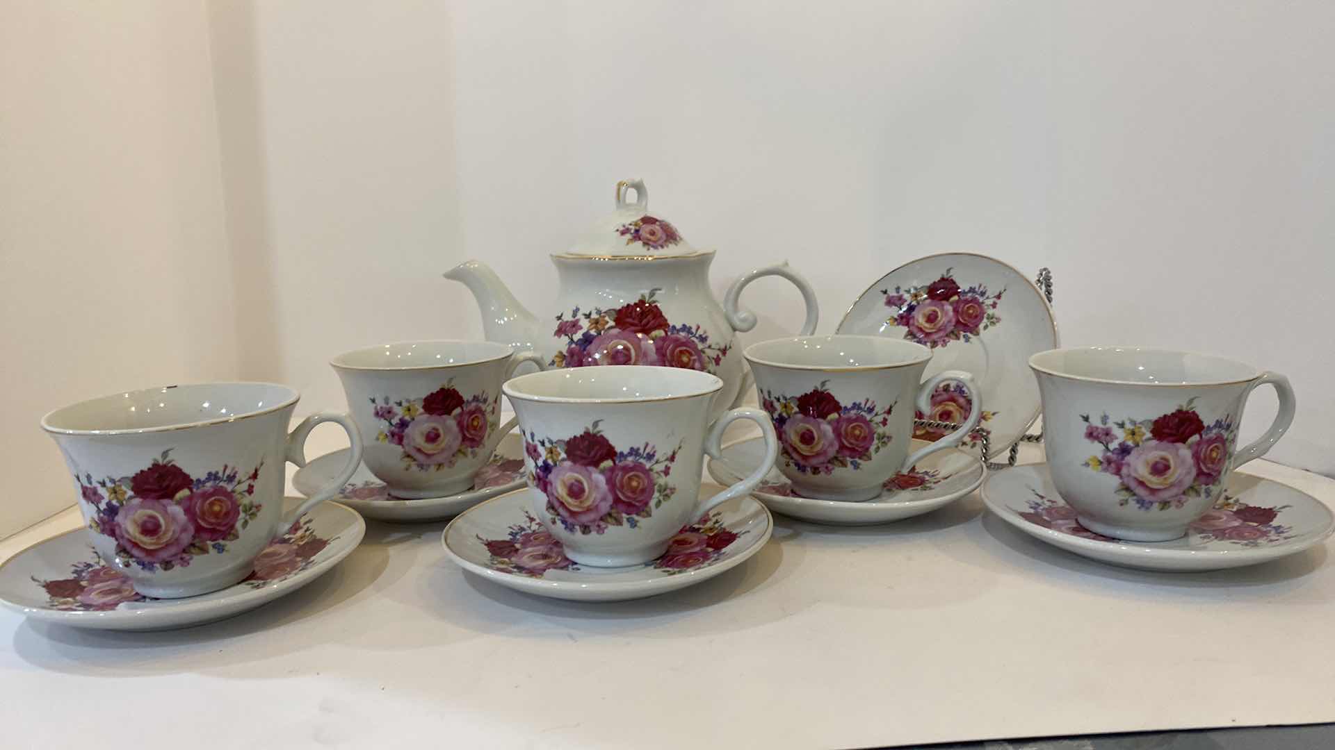 Photo 2 of GOKDEN STAR IMPORTS PORCELAIN TEA SET 13 PIECES