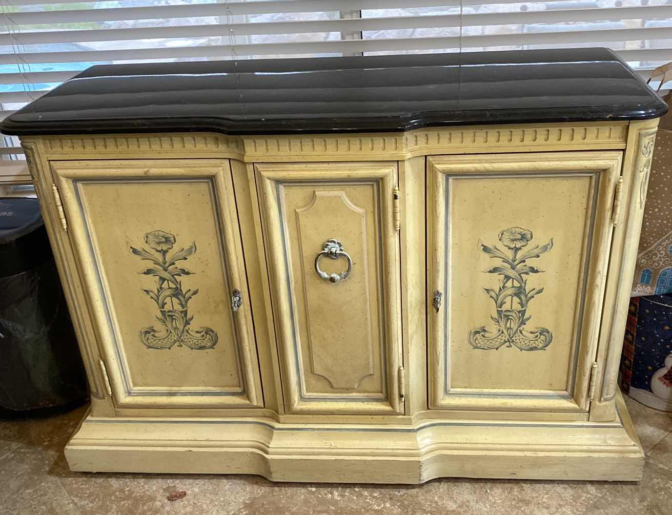 Photo 1 of SIDEBOARD WITH BLACK STONE TOP AND FLIRAL DESIGN 43“ x 19“ H 29”