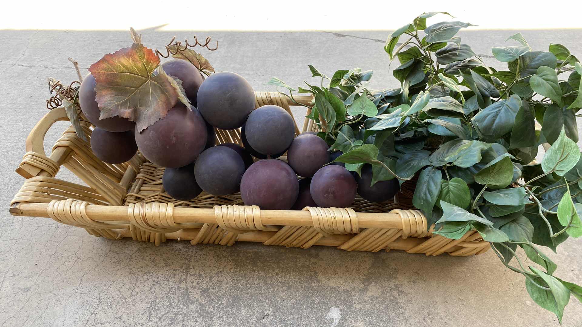 Photo 1 of LARGE BASKET WITH FAUX GRAPES AND FAUX PLANT 36” x 14”