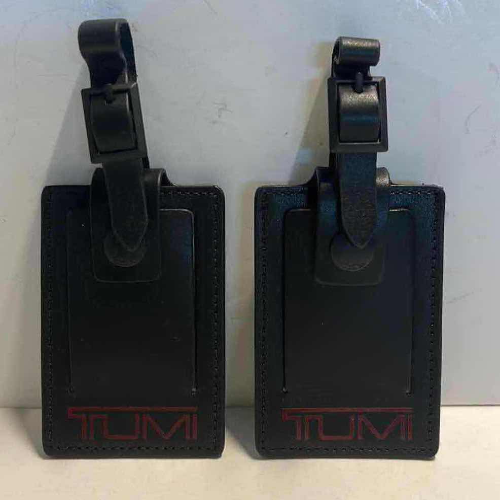 Photo 1 of 2 NEW TUMI LUGGAGE TAGS $25 ea