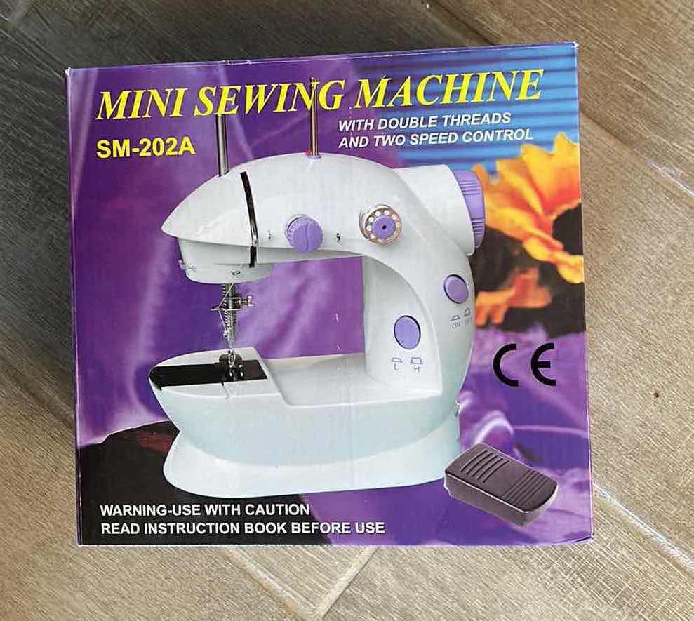 Photo 1 of MINI SEWING MACHINE