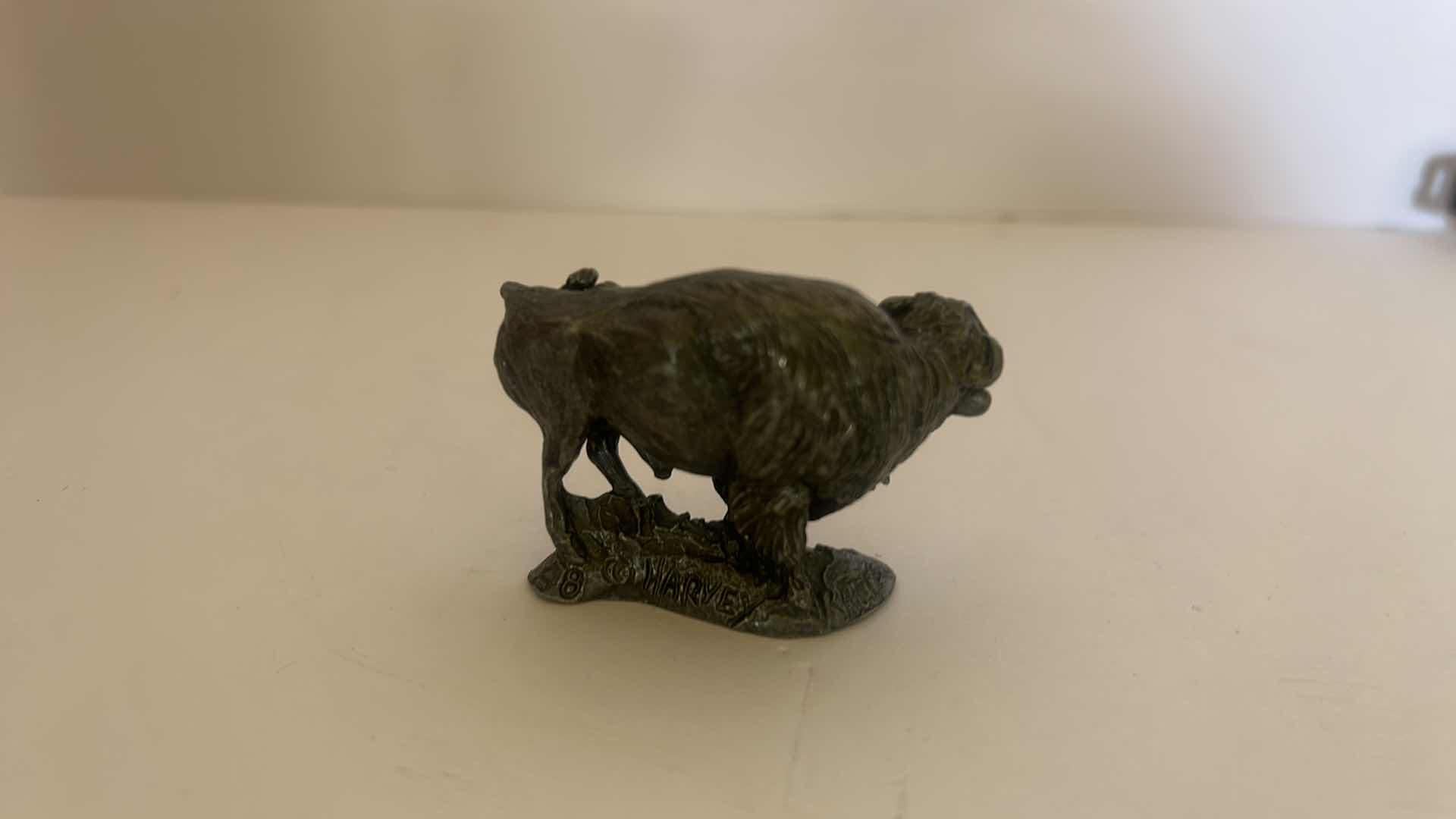 Photo 1 of INDIAN POTTERY FIGURE AND MINI PEWTER BUFFALO
